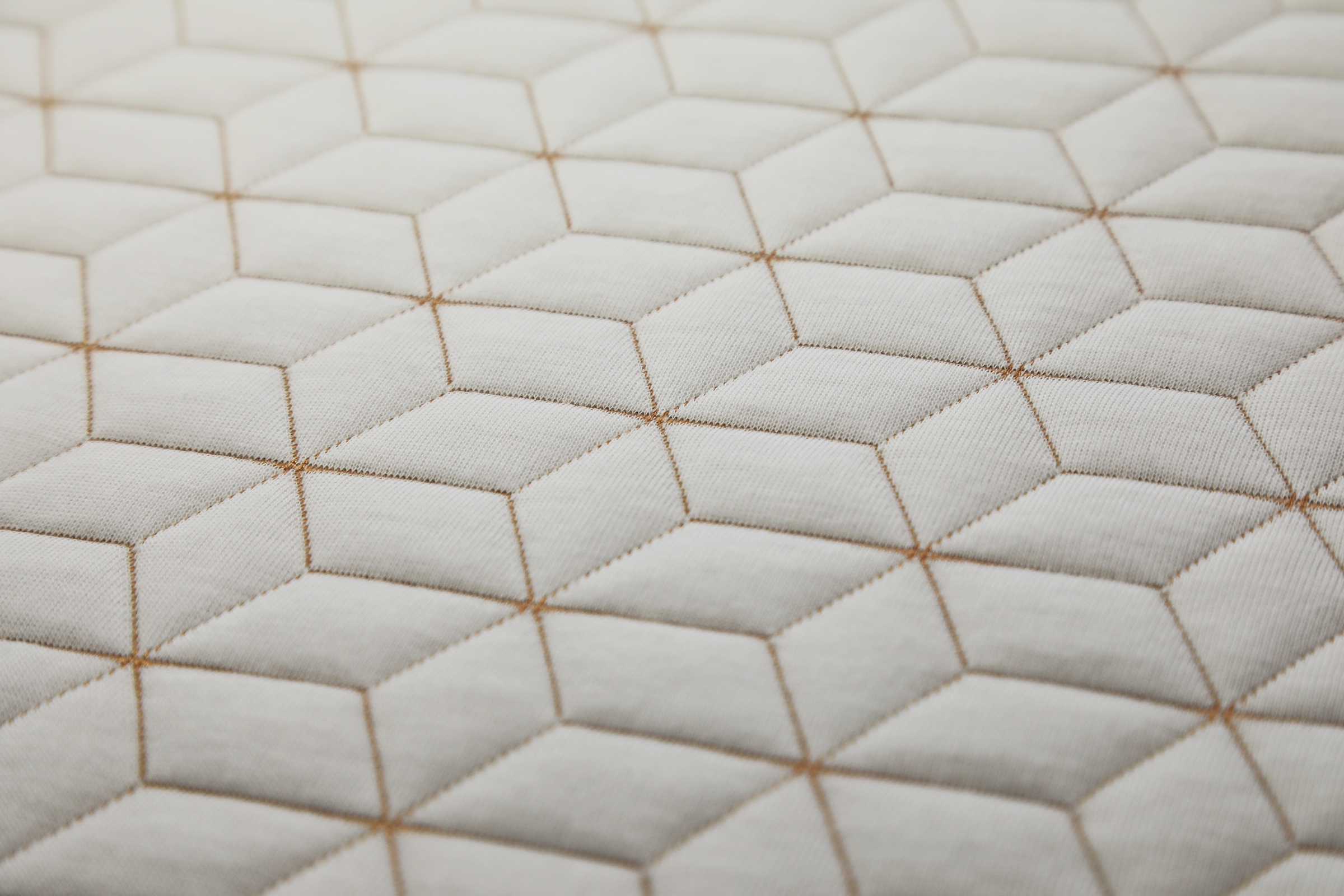 Ivory fabric with a geometric surface
